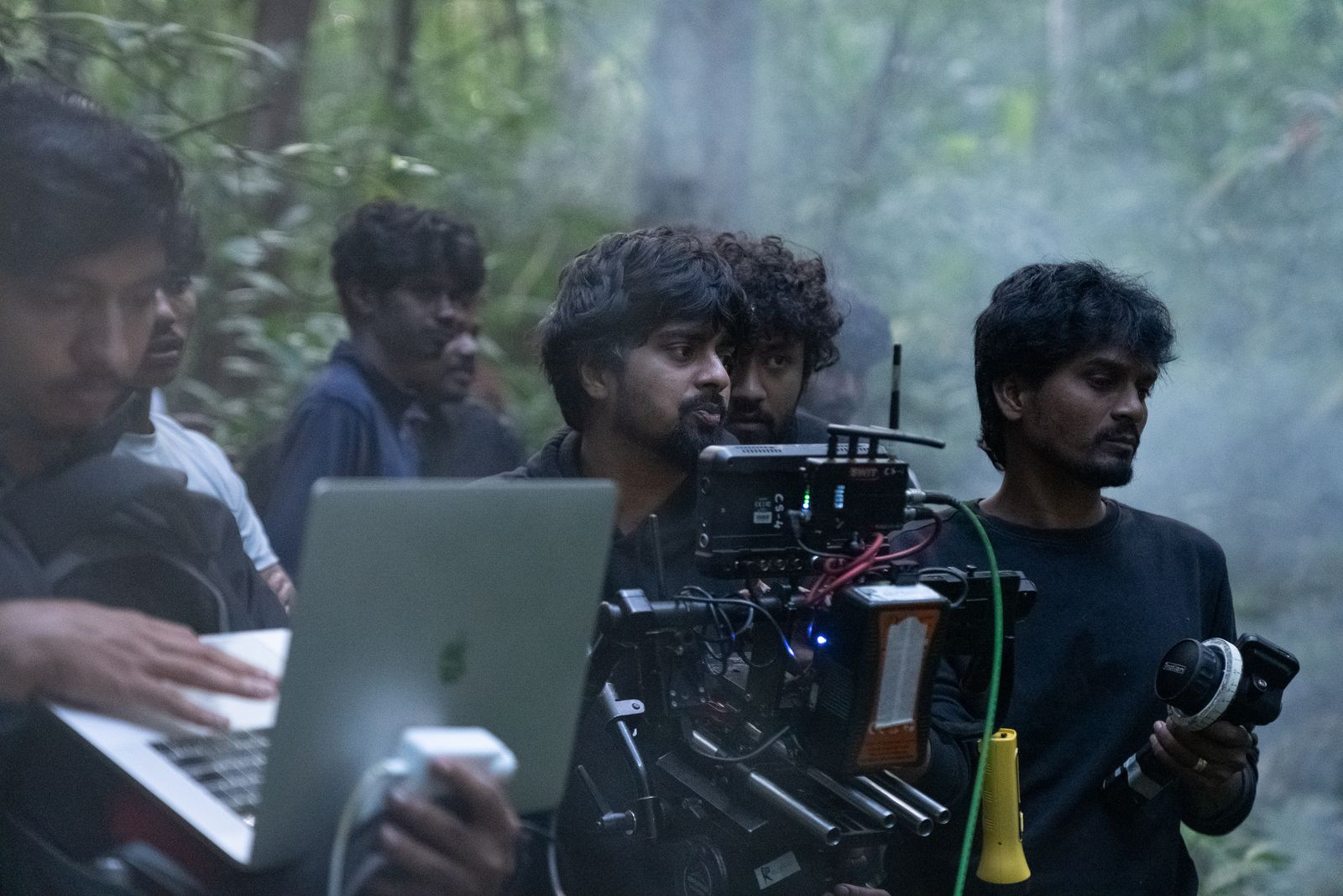 Crew on set — misty forest production